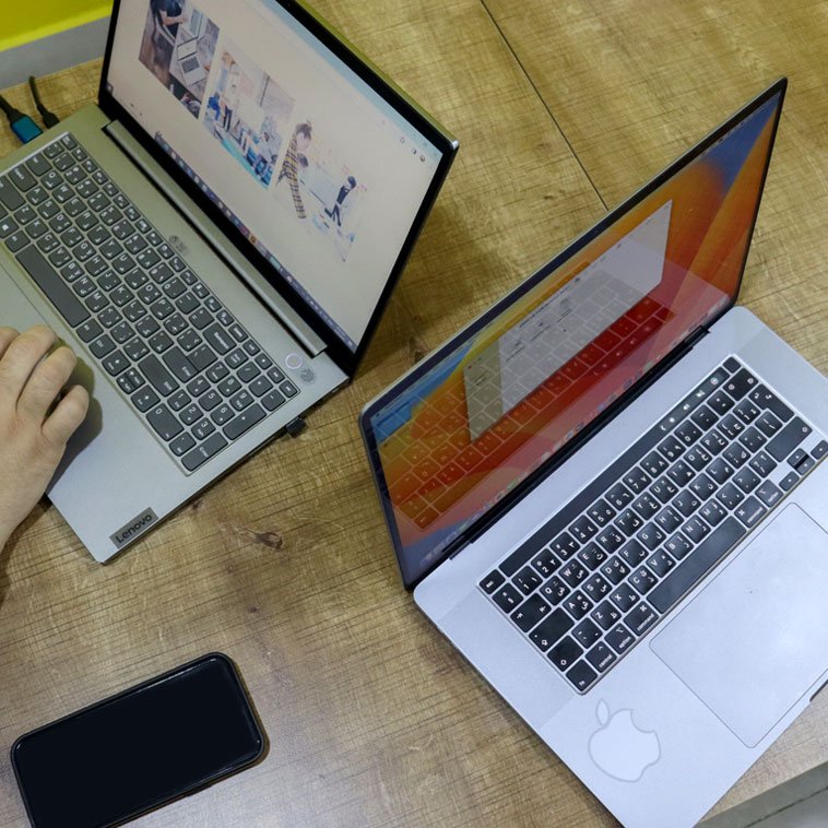 social-media-management-meeting-room-mobile-laptop